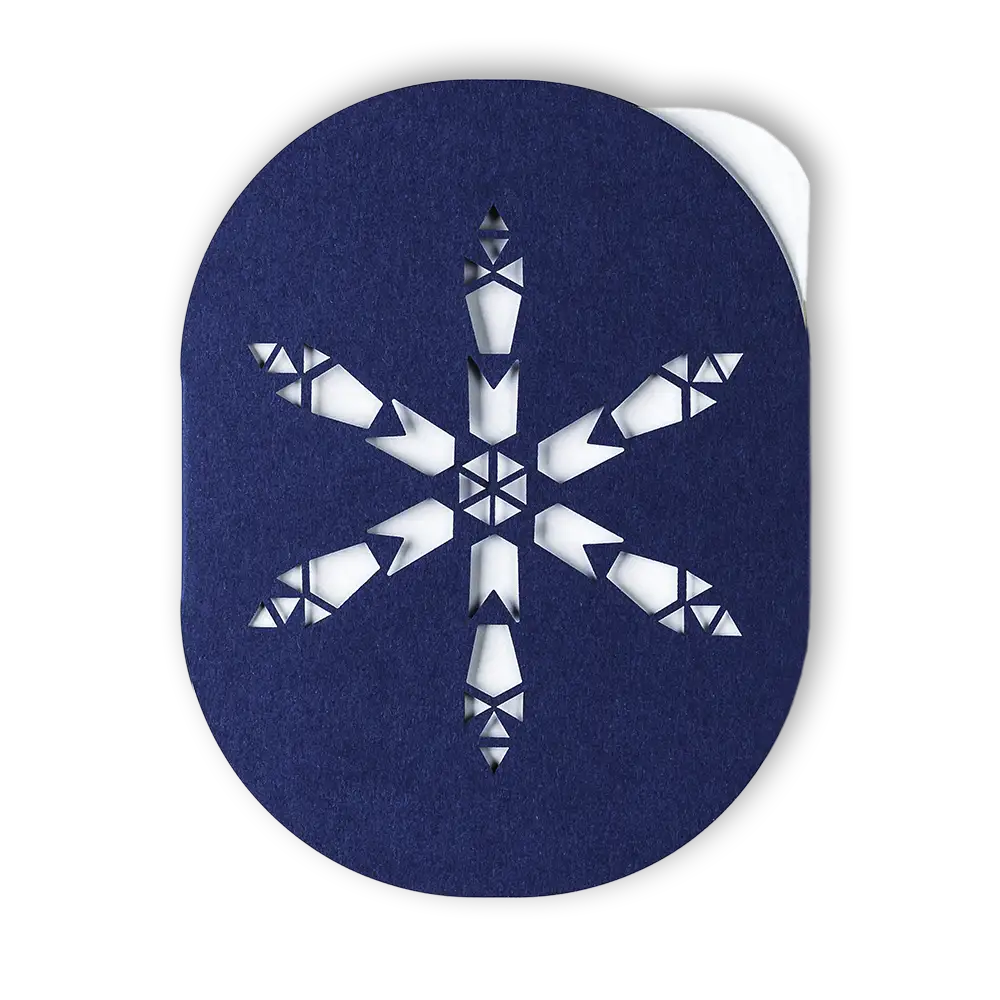 Laser cut holiday greeting card featuring a snowflake