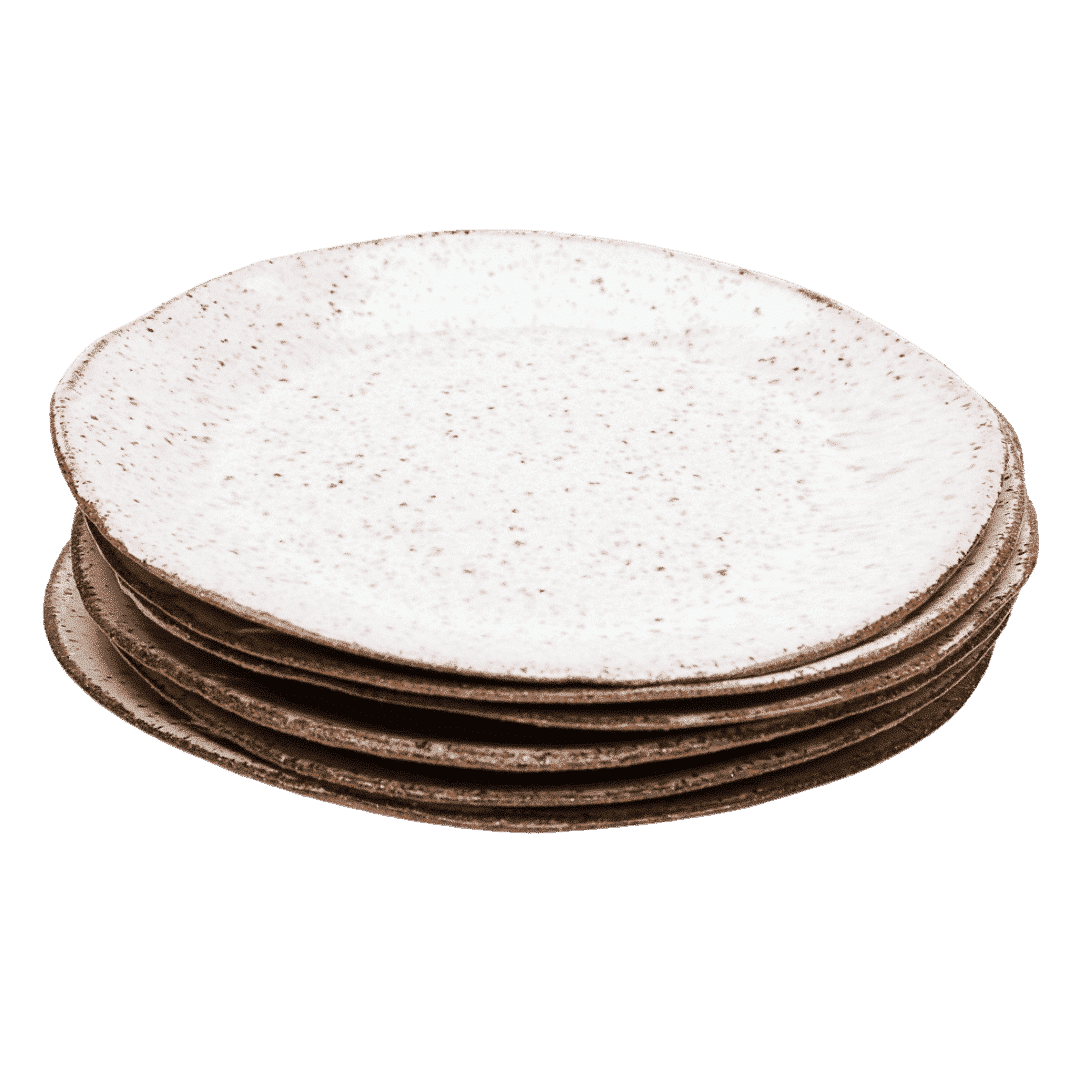 Set of six handmade ceramic dessert plates with speckled ivory glaze, stacked to show organic edges and natural clay base